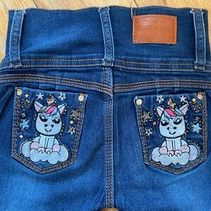 Silver & Gold high waisted jeggings with unicorns on back pockets.